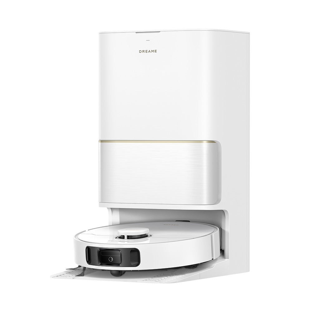 White robot vacuum docked with a lid-up base station