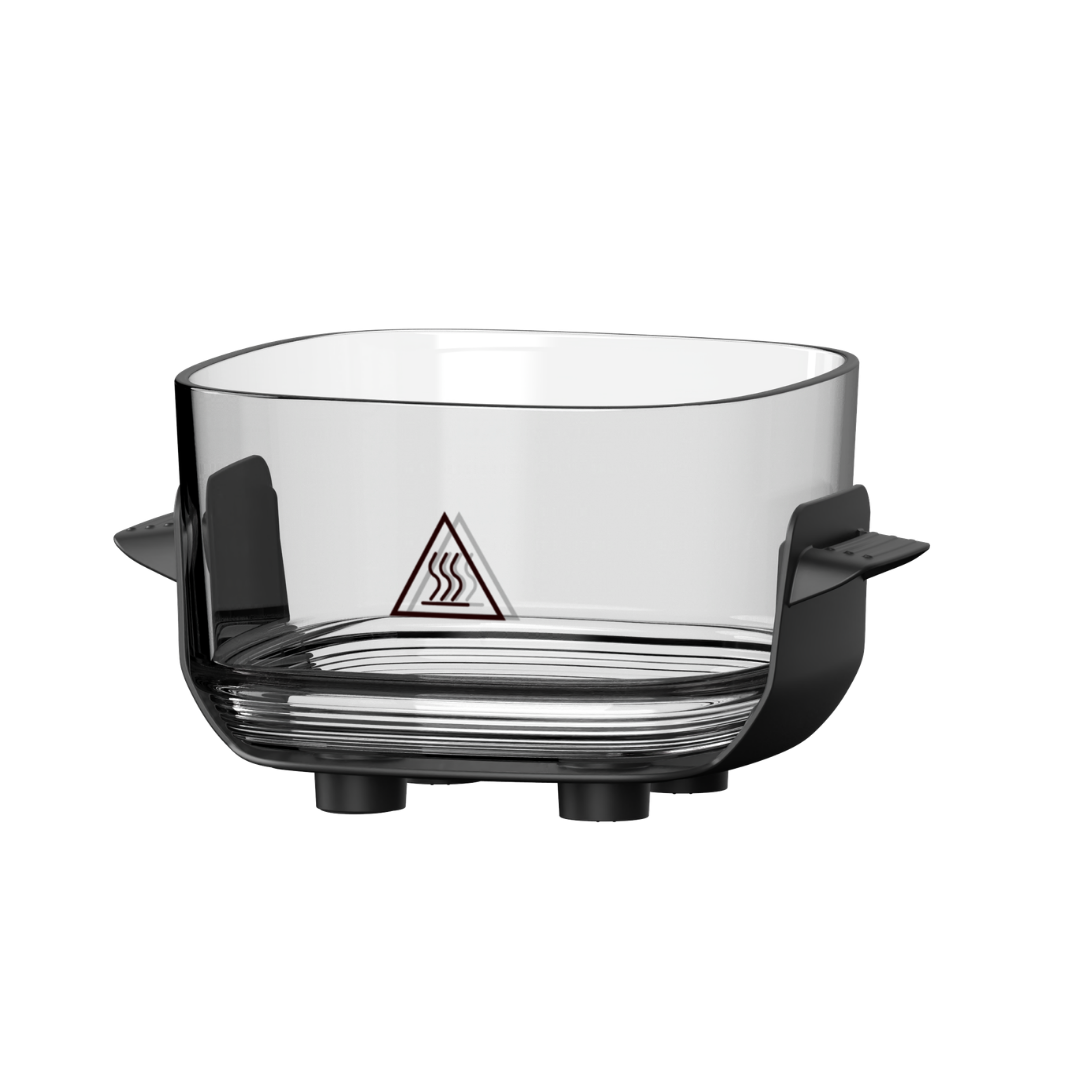 Clear glass air fryer container with black handles and warning symbol