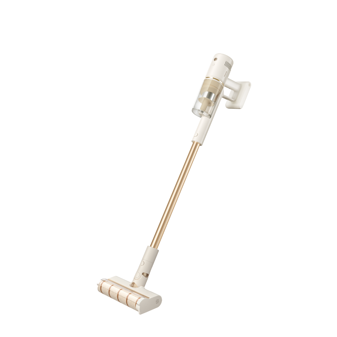 Stick vacuum with floor brush head and crevice nozzle, gold tube and white body
