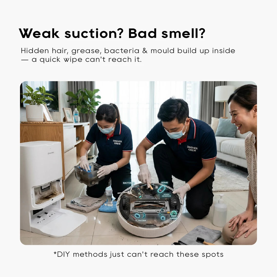 Technician team performing robot vacuum cleaning service indoors beside a vacuum