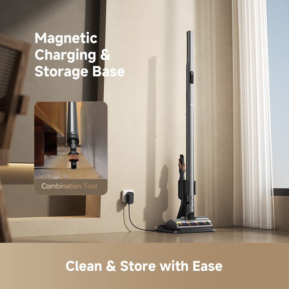 Gray cordless vacuum with wall-mounted charging and storage base, standing upright