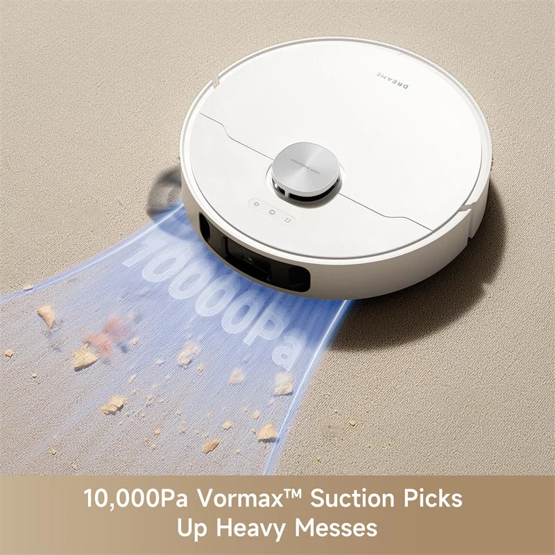 White robotic vacuum on carpet, top sensor disc and edge brushes visible.