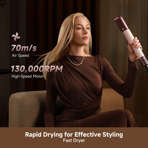 Pink high-speed hair styling styler held near long blond hair