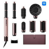 Hair styler with rose-gold barrel and multiple brush/attachment heads, plus power cord