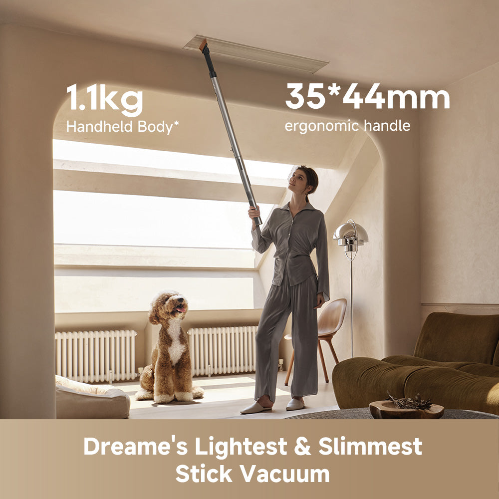 Cordless stick vacuum cleaner being used, with floor brush head on carpet.