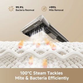 Steam spot cleaner nozzle releasing steam on a mattress surface