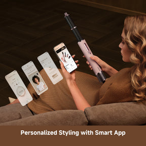 Rose-gold hair styler with smartphone app controls shown near the device