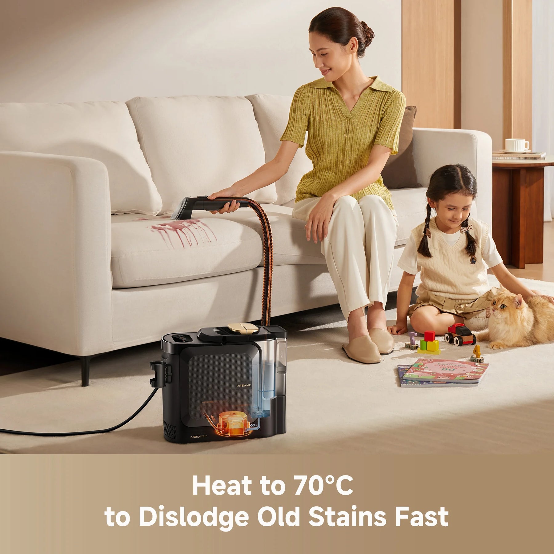 Steam spot cleaner on floor with steam wand for cleaning a sofa and rug
