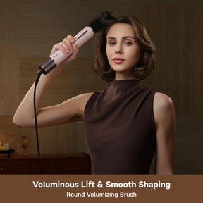 Hair styler held by handle with round brush barrel attachment and smooth airflow
