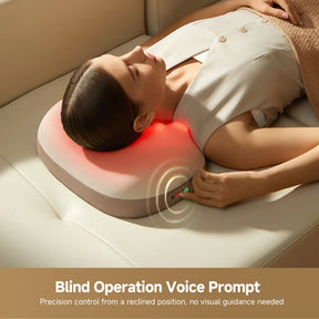 Waist massager pillow resting on a sofa with heat lights under the collar area