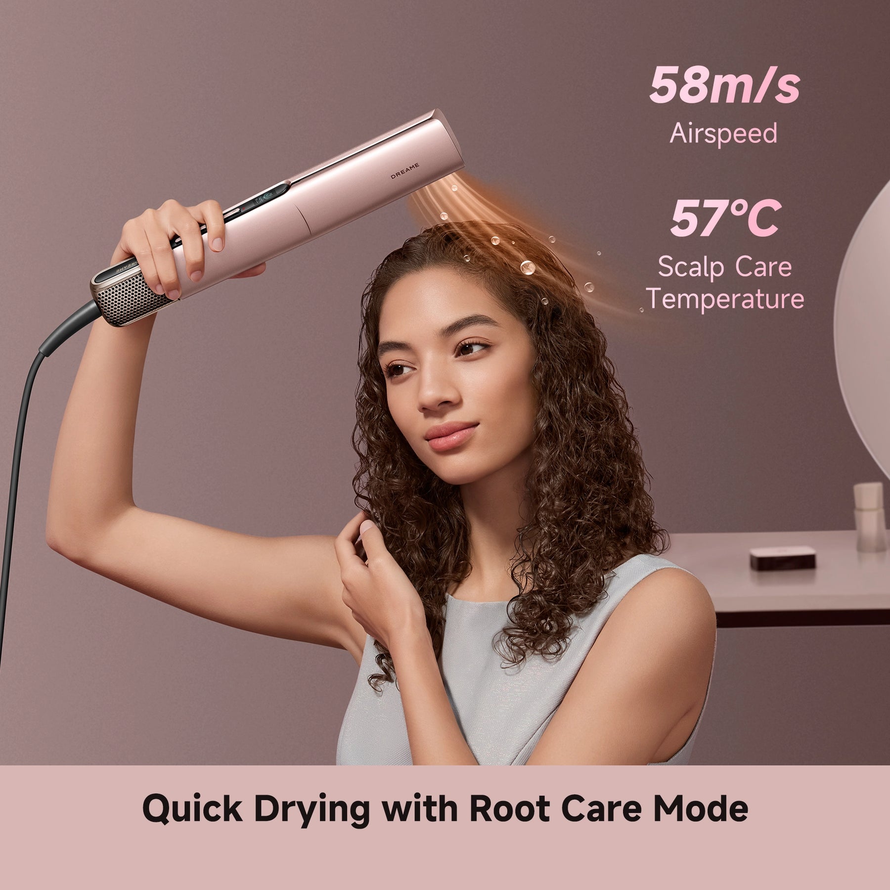 Rose-gold air straightener drying and straightening curly hair