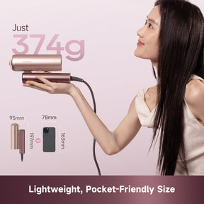 Rose gold handheld hair dryer with attached power cord