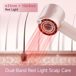 Rose-gold hair dryer showing dual red light bands at the intake vent