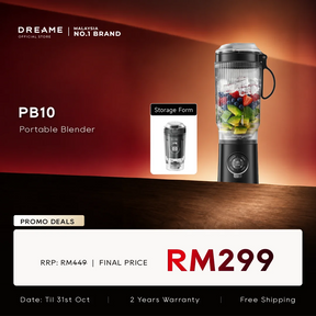 Portable blender with clear cup and handle, filled with sliced fruit and lid