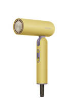 Yellow pocket hair dryer with circular nozzle and dark handle