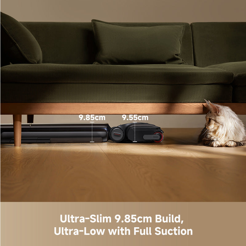 Dreame wet dry vacuum slim nozzle cleaning under a sofa with a pet nearby
