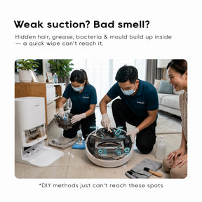 On-site technicians servicing a robot vacuum with tools during deep cleaning